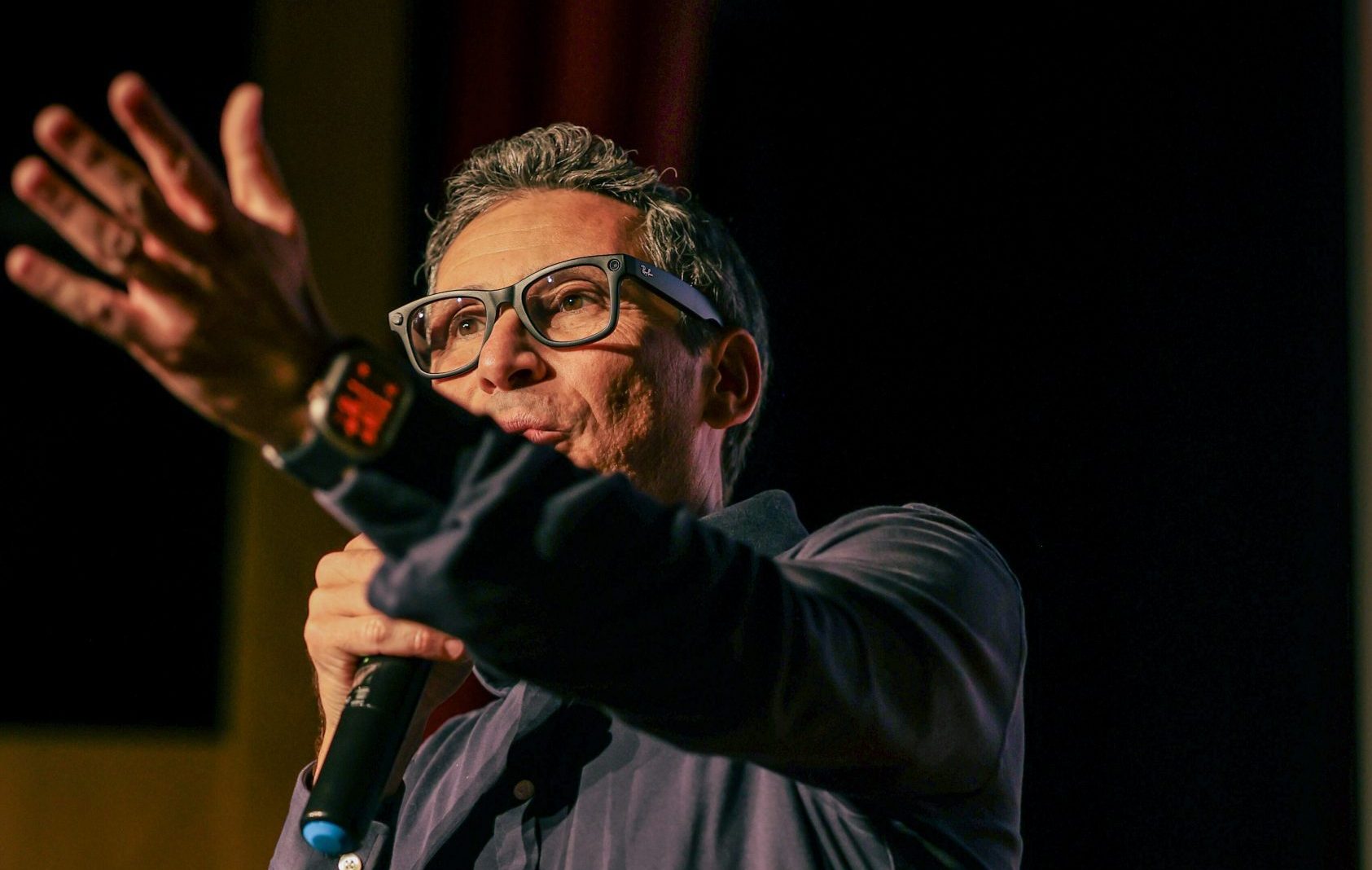 Emcee speaking at an event.